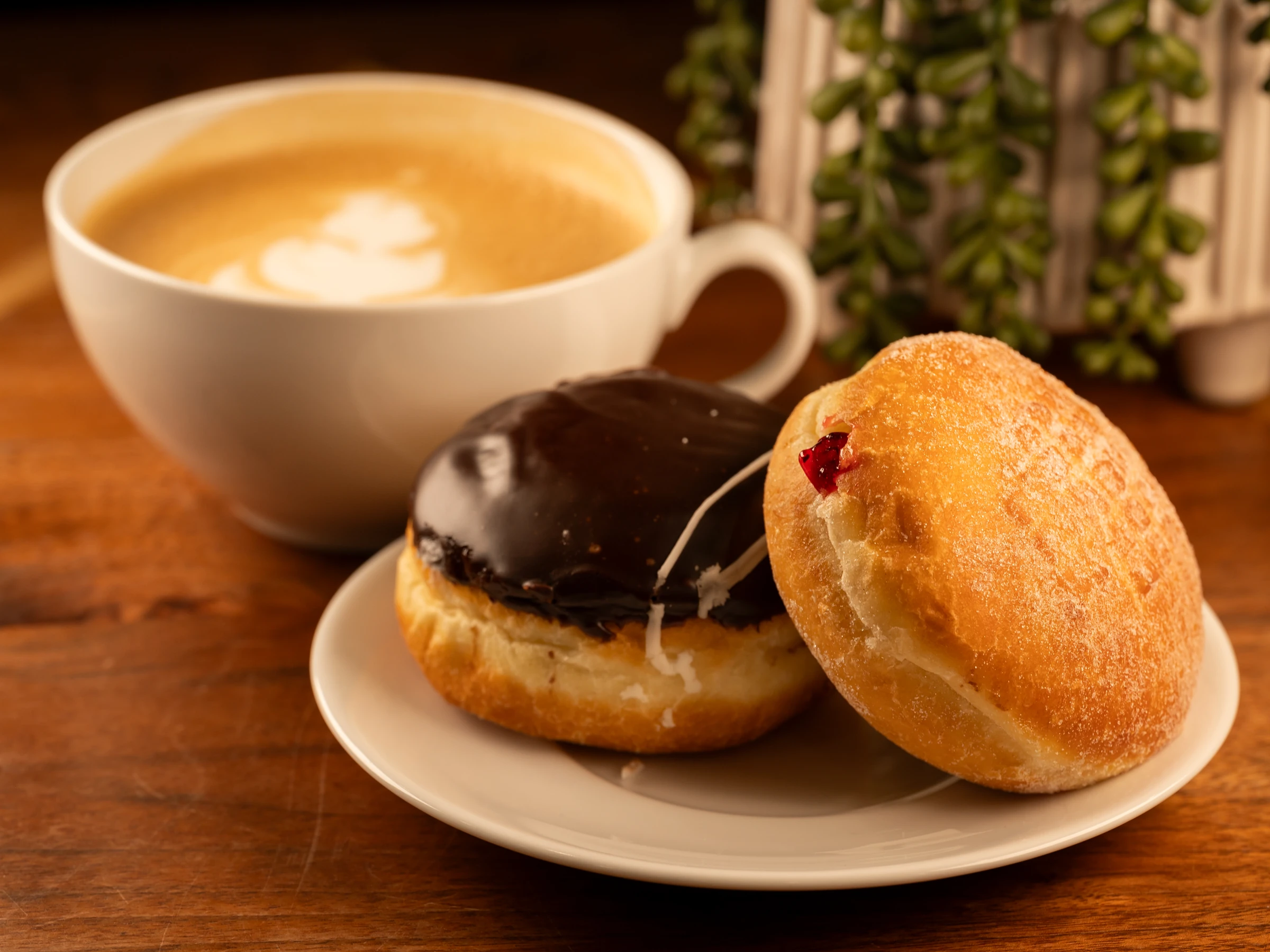 Fresh Crosby donuts with a hot coffee