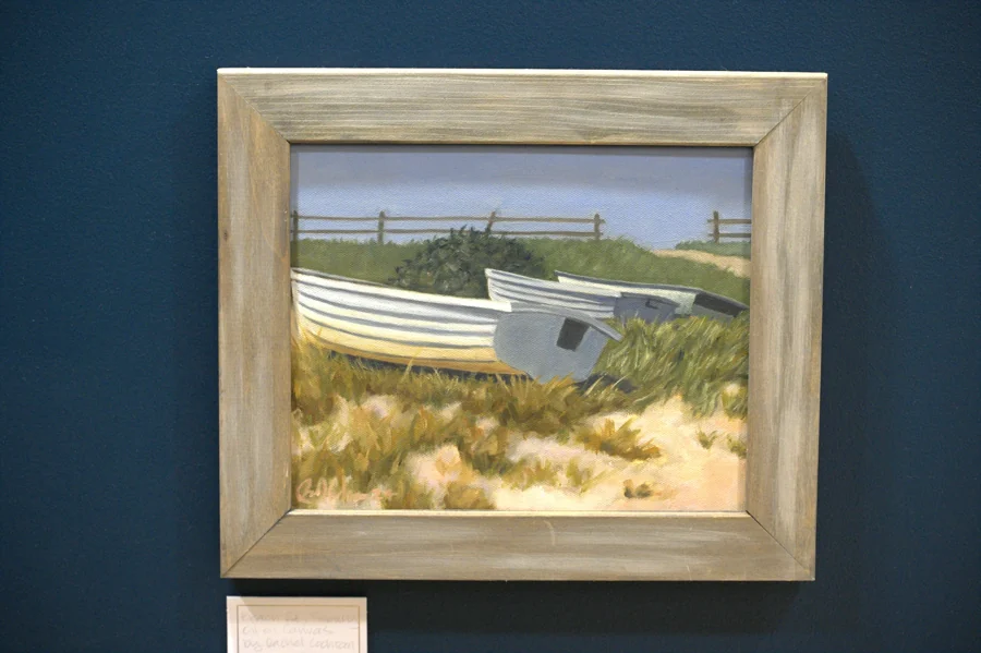 A painting by Rachel Cochran displayed through the café gallery