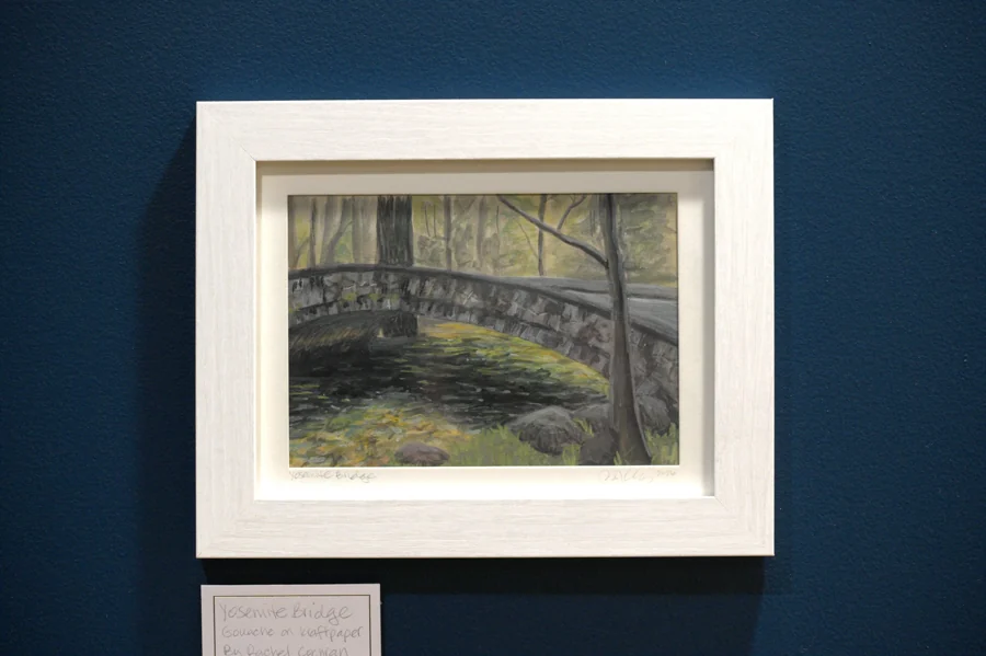 Woodland footbridge painting by Rachel Cochran at the café